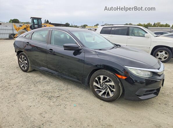 2HGFC2F74GH577896 2016 HONDA CIVIC Black Front interior view