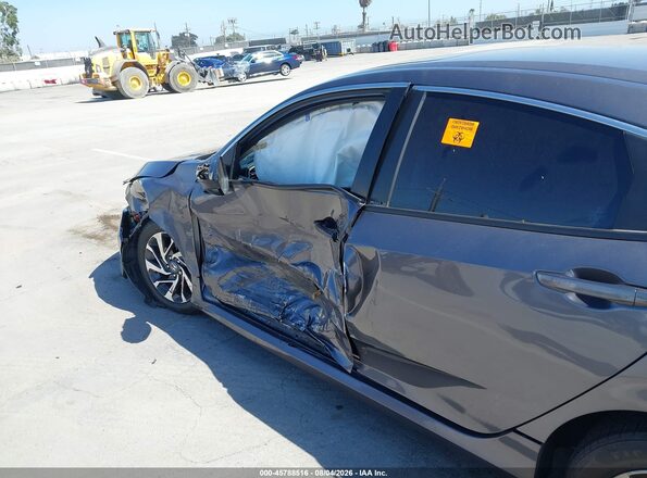 2HGFC2F77JH535214 2018 HONDA CIVIC Gray Rear interior view