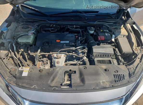 2HGFC2F79GH002502 2016 HONDA CIVIC Серебряный Вид задней части салона