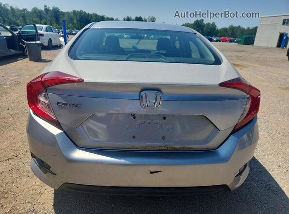 2HGFC2F79GH002502 2016 HONDA CIVIC Серебряный Вид сзади
