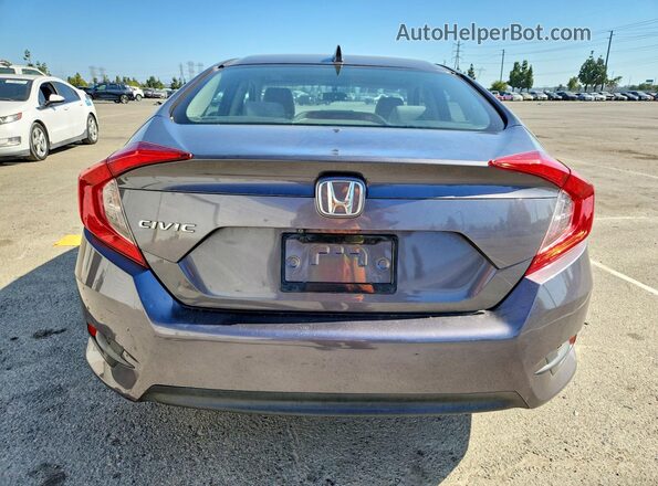 2HGFC2F79JH540687 2018 HONDA CIVIC Gray Rear view