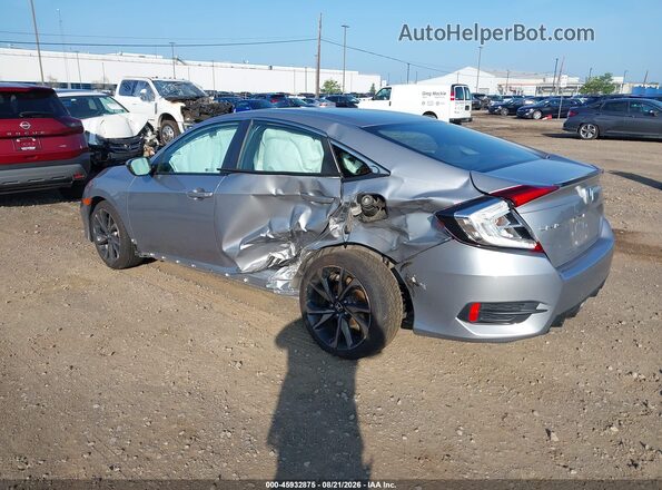 2HGFC2F8XKH600714 2019 HONDA CIVIC Silver Trasero izquierdo