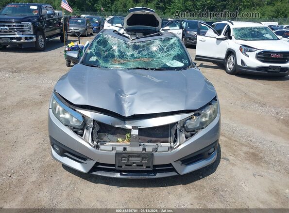 2HGFC3B34GH352712 2016 HONDA CIVIC Серебряный Вид щитка приборов