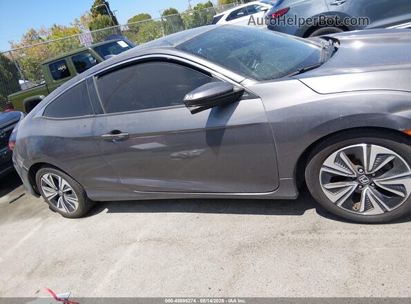 2HGFC3B38GH359694 2016 HONDA CIVIC Gray Widok wnętrza z tyłu
