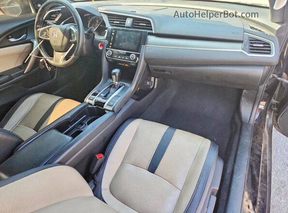 2HGFC3B72JH357854 2018 HONDA CIVIC Черный Вид панели приборов