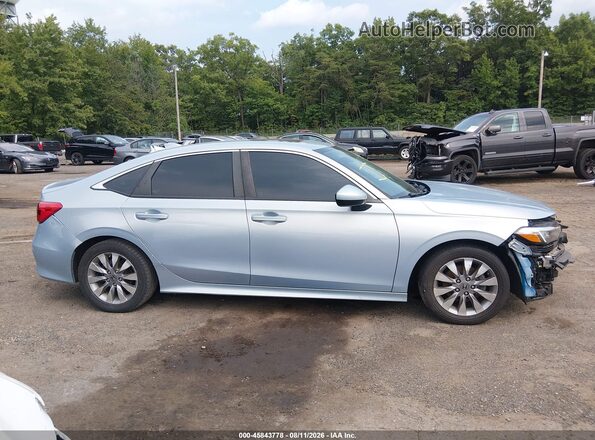 2HGFE1F73NH326644 2022 HONDA CIVIC Teal Սալոնի հետևի տեսք
