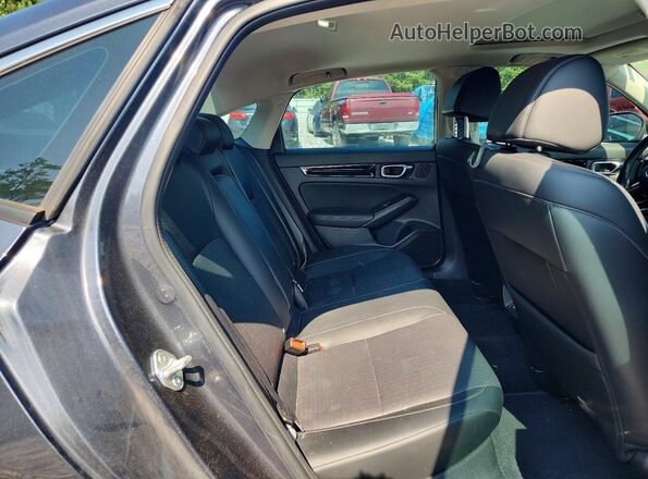 2HGFE1F91PH306946 2023 HONDA CIVIC Black Vista de los asientos traseros