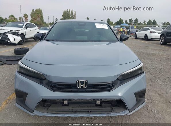 2HGFE2F51PH507135 2023 HONDA CIVIC Light Blue Вид задньої частини салону