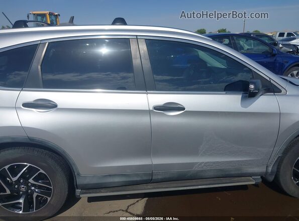 2HKRM3H47GH512341 2016 HONDA CR-V Серебряный Вид задней части салона