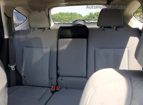2HKRM4H53GH721610 2016 HONDA CR-V Maroon Vista de los asientos traseros