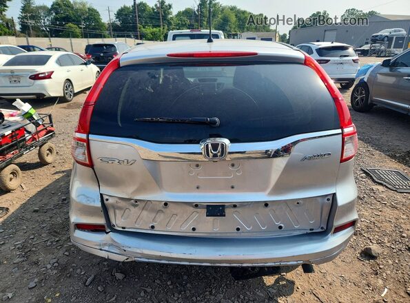 2HKRM4H56GH687968 2016 HONDA CR-V Silver Rear view