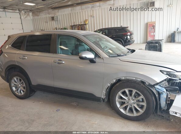 2HKRS4H74PH431741 2023 HONDA CR-V Silver Widok wnętrza z tyłu