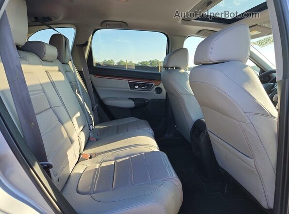 2HKRW1H84KH514929 2019 HONDA CR-V Silver Widok wnętrza z tyłu