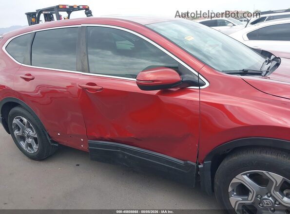 2HKRW1H89HH511596 2017 HONDA CR-V Red Vista interior trasera