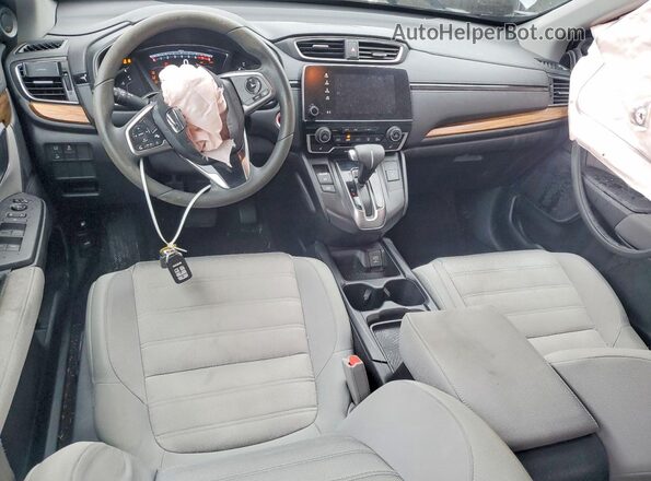 2HKRW2H50HH608228 2017 HONDA CR-V Gray Vista del salpicadero