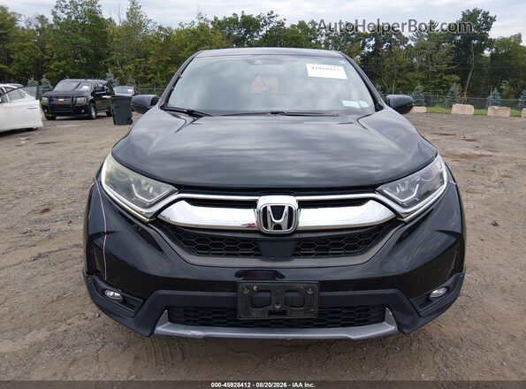2HKRW2H50JH647701 2018 HONDA CR-V Black Widok wnętrza z tyłu