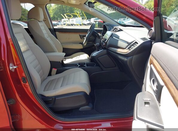 2HKRW2H50JH673067 2018 HONDA CR-V Оранжевый Вид салона спереди