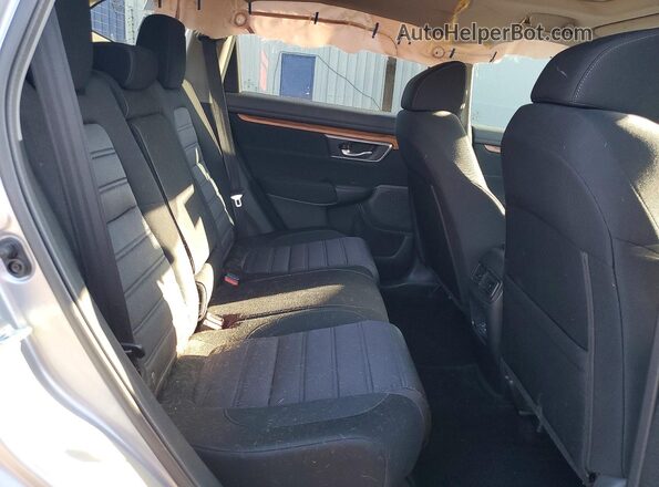 2HKRW2H52HH690950 2017 HONDA CR-V Серебряный Вид задней части салона