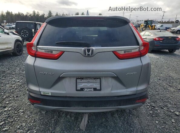 2HKRW2H53JH115276 2018 HONDA CR-V Silver Vista trasera
