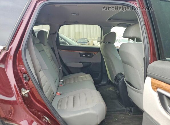2HKRW2H54HH616476 2017 HONDA CR-V Красный Вид задней части салона
