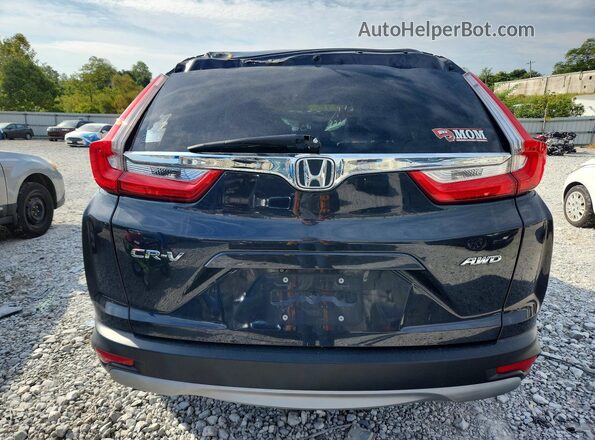 2HKRW2H80KH615486 2019 HONDA CR-V Charcoal Vista interior trasera