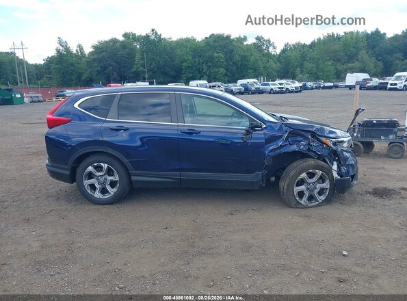 2HKRW2H82KH643063 2019 HONDA CR-V Dark Blue Rear interior view