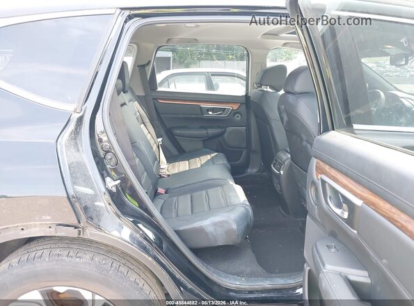 2HKRW2H91HH600738 2017 HONDA CR-V Black VIN კოდის სტიკერის ხედი