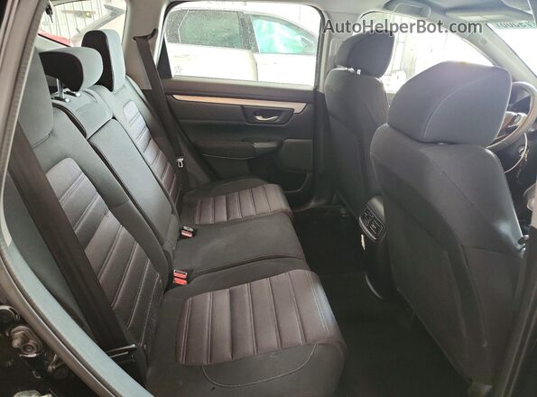 2HKRW6H32JH220588 2018 HONDA CR-V Black Vista de los asientos traseros
