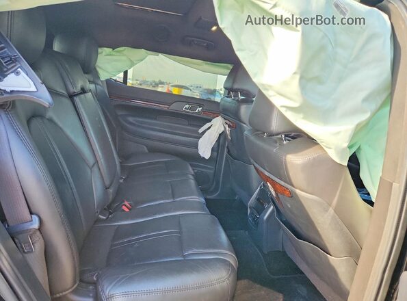 2LMHJ5NK7HBL00376 2017 LINCOLN MKT Черный Вид задней части салона