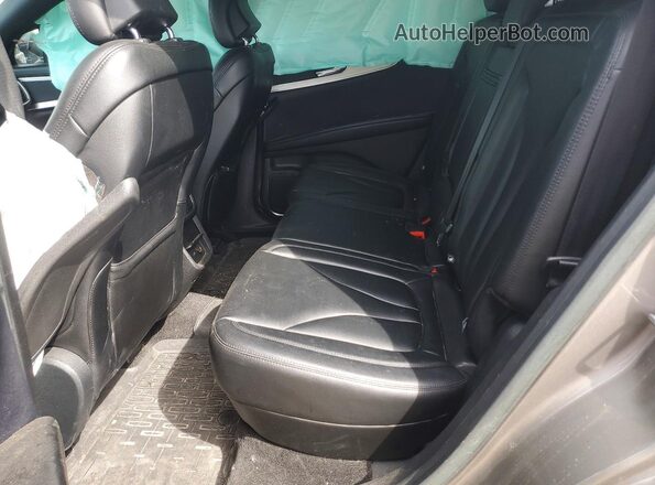 2LMPJ6JR3HBL44749 2017 LINCOLN MKX Серебряный Вид задней части салона