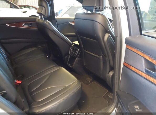 2LMPJ6K91KBL10234 2019 LINCOLN NAUTILUS Silver VIN կոդի պիտակի տեսք