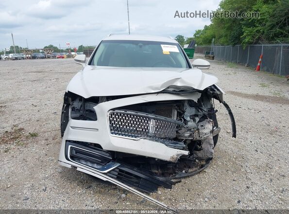 2LMPJ6K95KBL32642 2019 LINCOLN NAUTILUS Cream Rear interior view