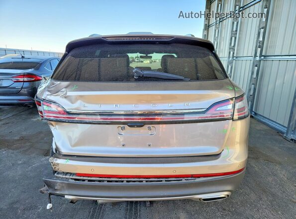 2LMPJ6K9XLBL35361 2020 LINCOLN NAUTILUS Tan Հետևի տեսք