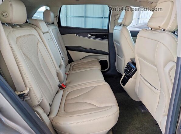 2LMPJ6K9XLBL35361 2020 LINCOLN NAUTILUS Tan Սալոնի հետևի տեսք