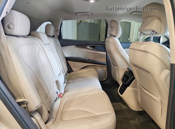 2LMPJ6KP6HBL41468 2017 LINCOLN MKX Желто-коричневый Вид задней части салона