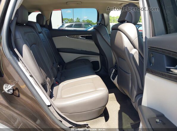 2LMPJ6LP6KBL13403 2019 LINCOLN NAUTILUS Brown VIN sticker view