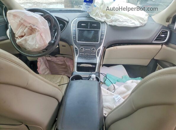 2LMPJ6LR7HBL16322 2017 LINCOLN MKX White Widok deski rozdzielczej