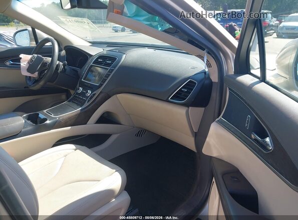 2LMPJ6LRXHBL33132 2017 LINCOLN MKX Champagne Widok wnętrza z przodu
