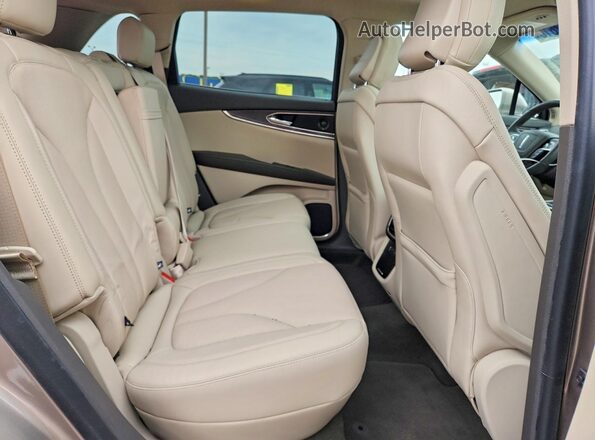 2LMPJ8K98LBL15993 2020 LINCOLN NAUTILUS Желто-коричневый Вид задней части салона