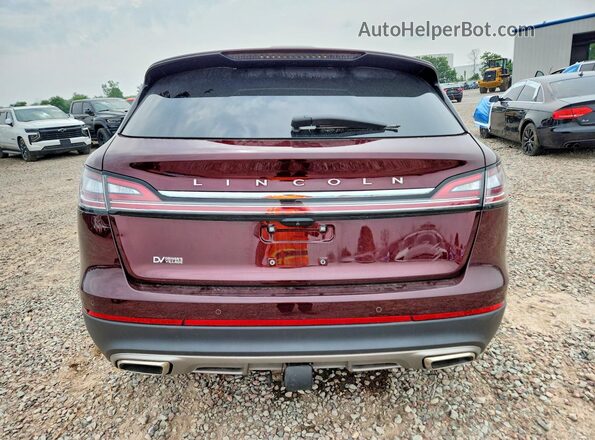 2LMPJ8K98PBL14395 2023 LINCOLN NAUTILUS Maroon Vista trasera