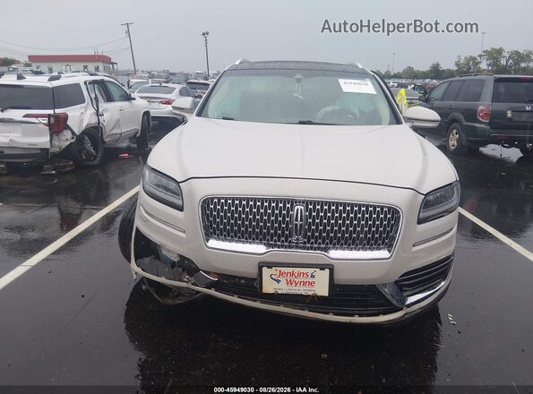 2LMPJ8LP2KBL28184 2019 LINCOLN NAUTILUS Белый Вид панели приборов