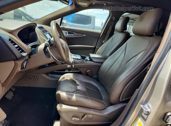 2LMPJ8LPXHBL40172 2017 LINCOLN MKX Золотой Вид салона спереди