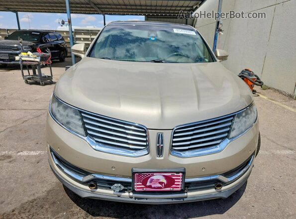2LMPJ8LPXHBL40172 2017 LINCOLN MKX Золотой Вид спереди