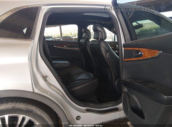 2LMPJ8LR8JBL17979 2018 LINCOLN MKX Silver VIN კოდის სტიკერის ხედი