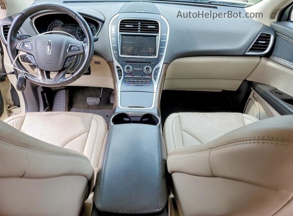 2LMPJ8LR9GBL33746 2016 LINCOLN MKX Beige Vista del salpicadero