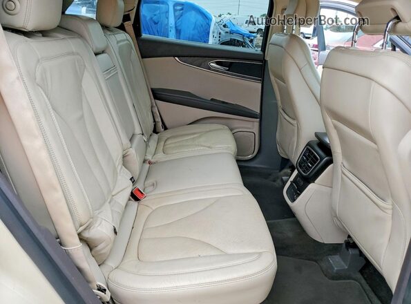 2LMPJ8LR9GBL33746 2016 LINCOLN MKX Beige Vista interior trasera