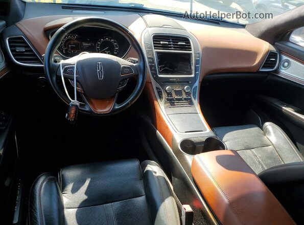 2LMPJ9JP1GBL74931 2016 LINCOLN MKX Черный Вид панели приборов