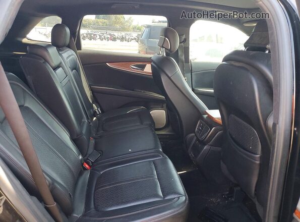 2LMPJ9JP1GBL74931 2016 LINCOLN MKX Черный Вид задней части салона