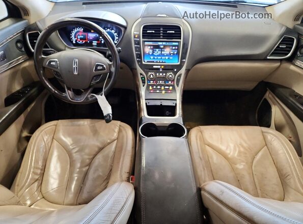 2LMTJ8KP3GBL36804 2016 LINCOLN MKX Черный Вид панели приборов