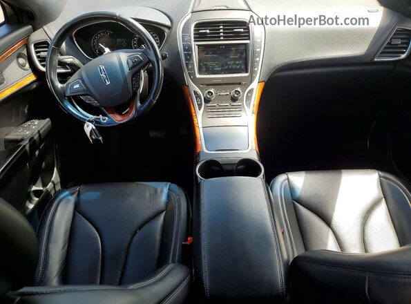 2LMTJ8LP1GBL21247 2016 LINCOLN MKX Black Vista del salpicadero